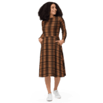 Woman in a brown plaid dress and white sneakers.