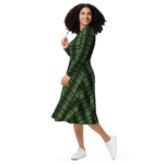 Woman in a green plaid dress and white sneakers.