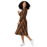 Woman wearing a brown plaid dress.