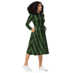 Woman wearing a green plaid dress.