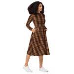 Woman in brown and black plaid dress.