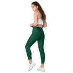 Woman wearing green workout leggings.