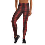 Woman wearing red plaid leggings.