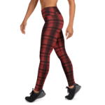 Red and black plaid leggings on a model.