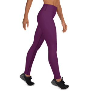 Woman wearing purple leggings and black shoes.