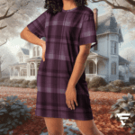 A woman in purple plaid dress standing next to a house.