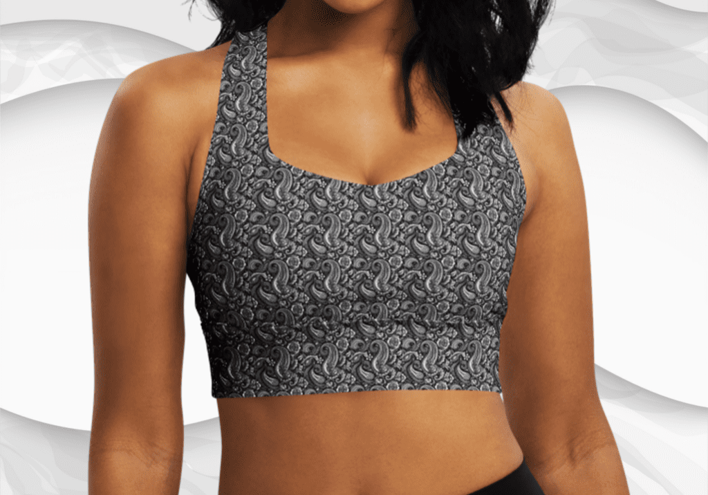 Woman wearing a paisley print sports bra.