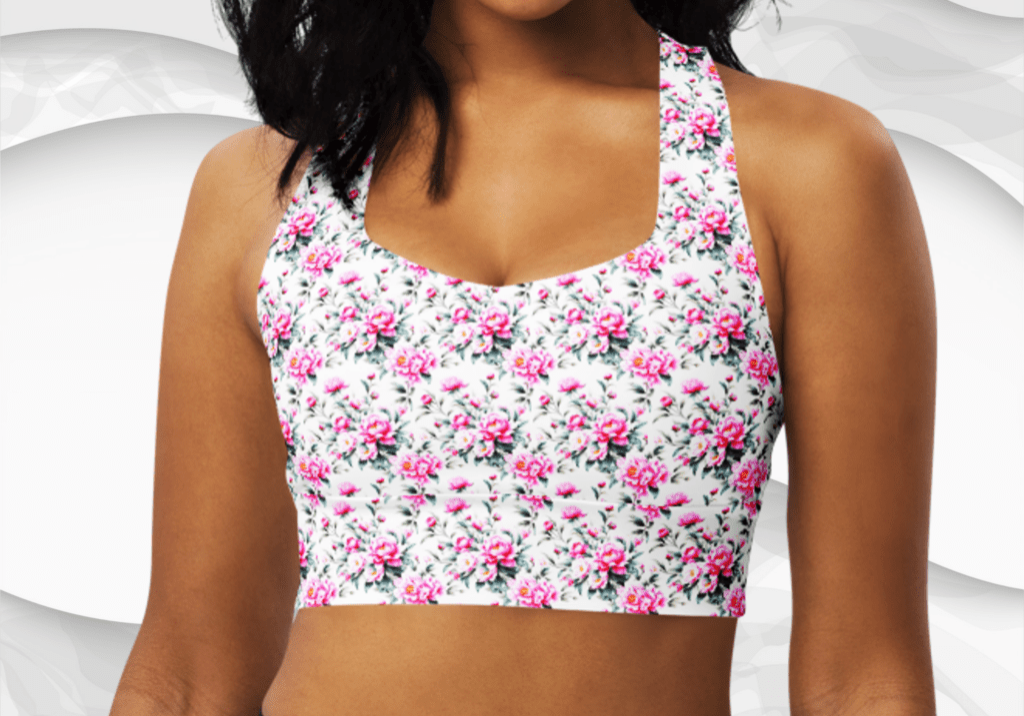 Woman wearing a floral print sports bra.