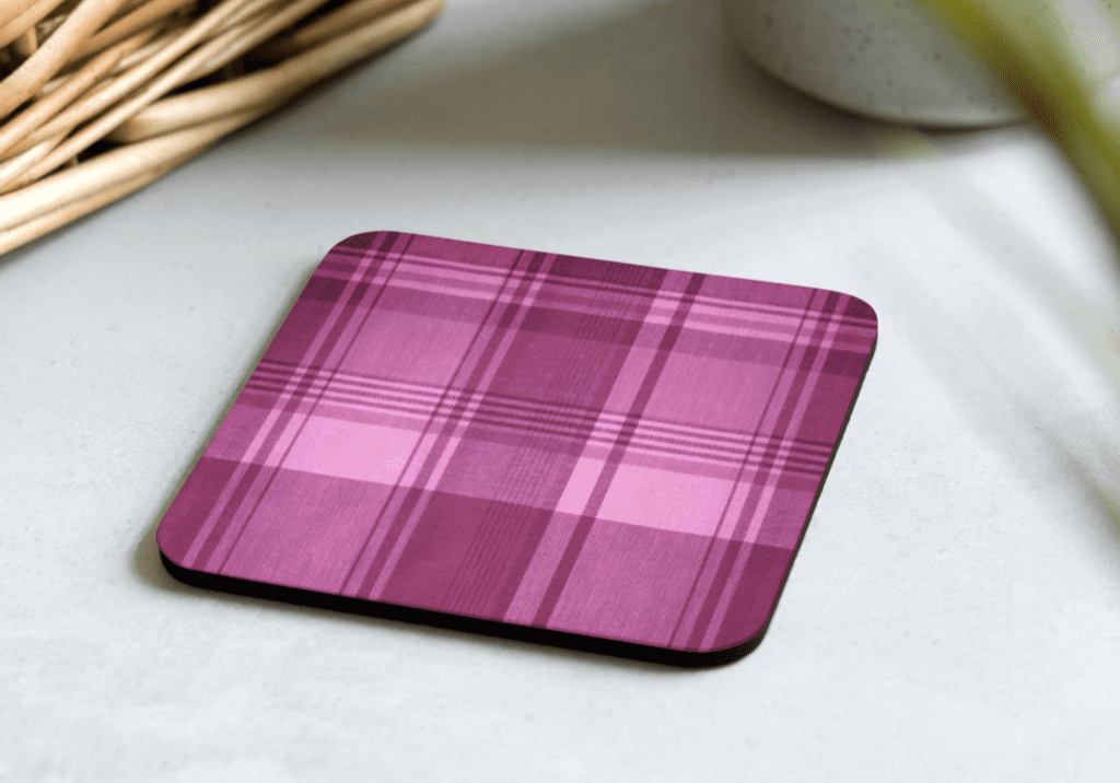 cork-back-coaster-front-660b0845aa471.png Pink and purple plaid coaster.