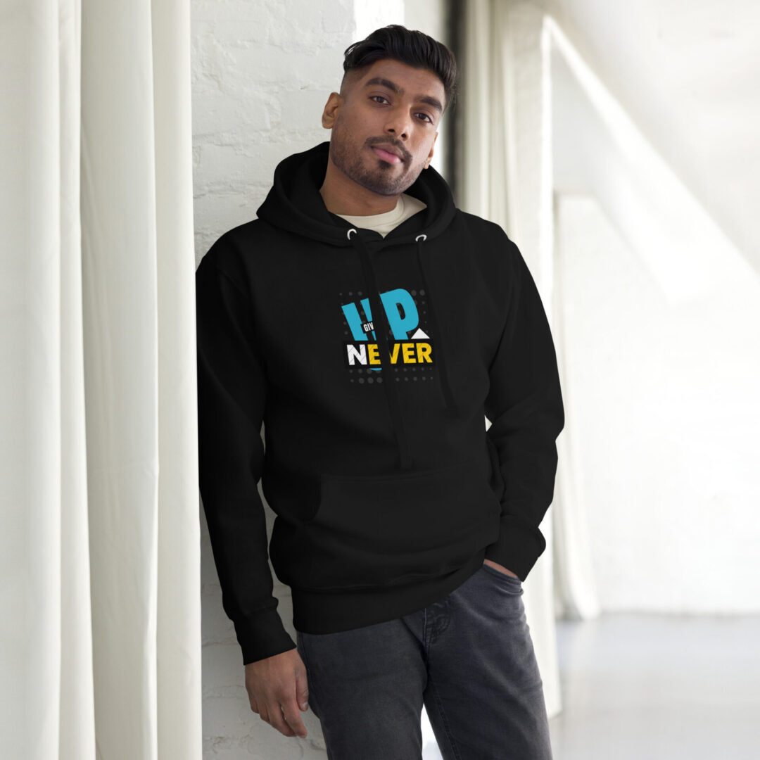 A man wearing a Men's Unisex Black Hoodie, NEVER GIVE UP, Teal Accents Front Pouch Pocket, 65% Cotton and 35% Polyester with the word dhnee.